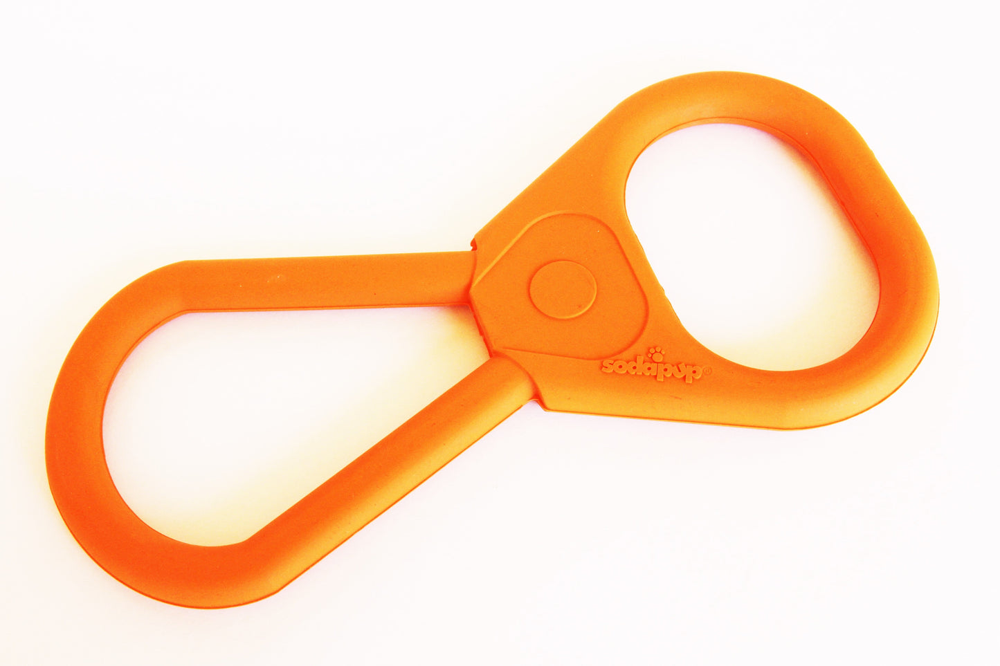 Rubber dog tug toy from SodaPup, designed for heavy chewers, featuring a pop top for interactive play, made in the USA.