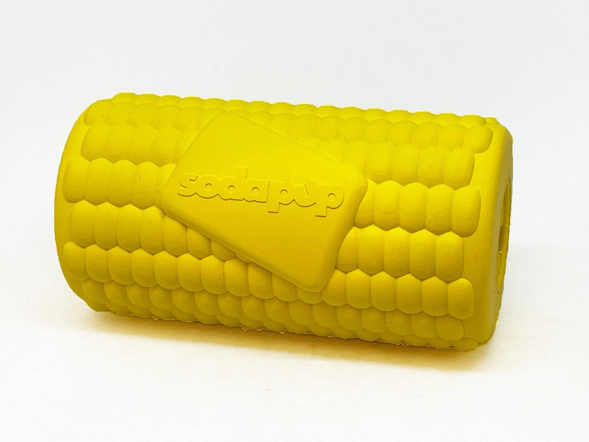 Yellow Corn on the Cob dog toy by SodaPup, made of durable rubber, treats dispenser for dogs.