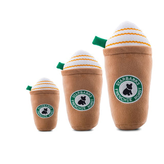 A plush coffee cup shaped dog toy styled like a coffee drink, with a straw and caramel drizzle