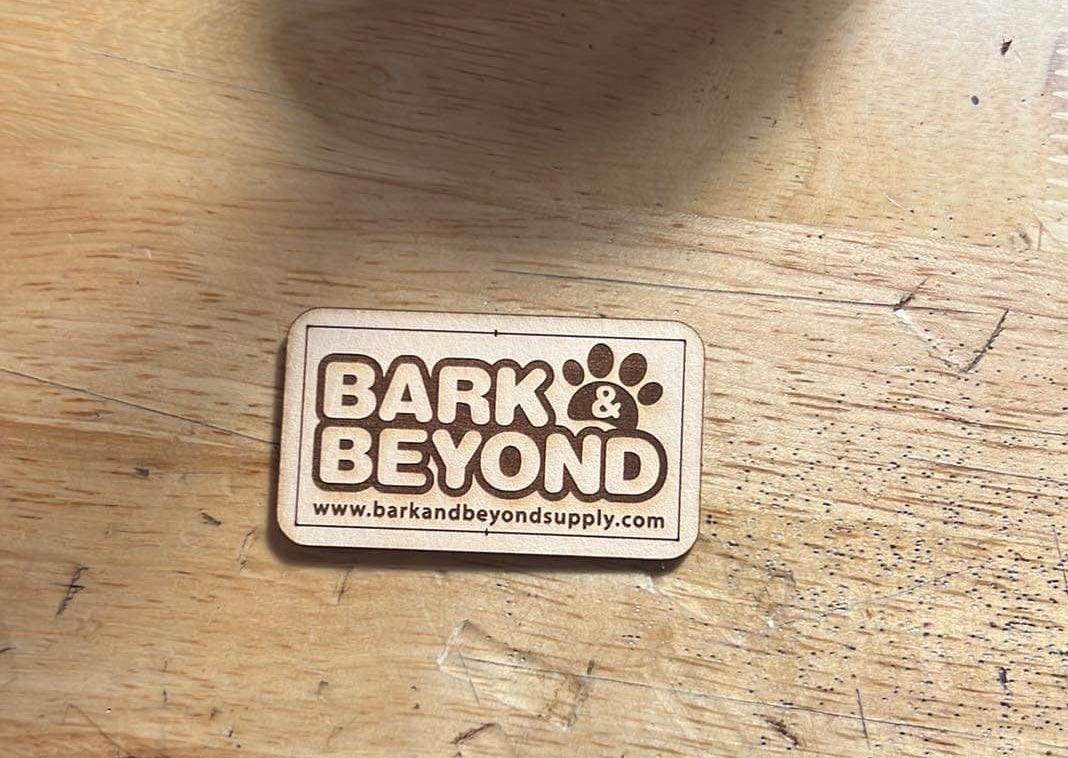 Bark & Beyond Leather Patch Logo Trucker Hat.